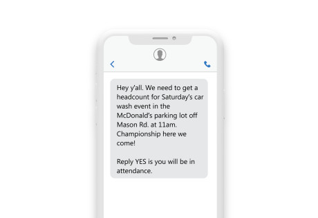 a phone sms reading “Hey y’all, Need to get a headcount for Saturday's car wash event in the McDonalds parking lot off of Mason Rd at 11 am. Reply Yes if you will be in attendance! Championship here we come!”