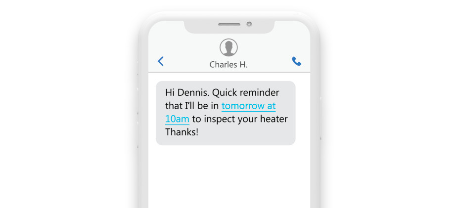 a phone with the message “Hi Dennis, Quick reminder that I’ll be in tomorrow at 10 am to inspect your heater. Thanks. -Charles”