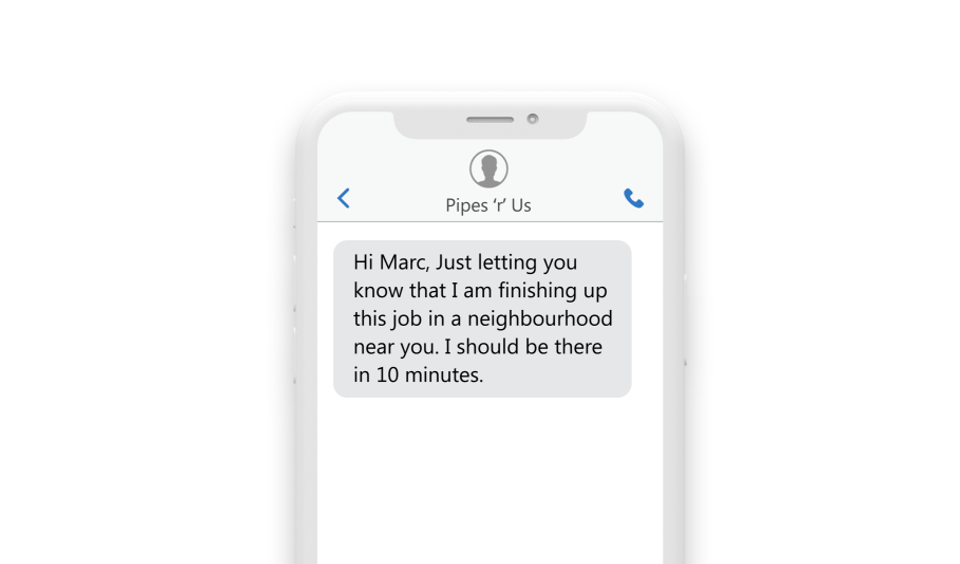 A text message on a phone showing: “Hi Marc, Just wanted you to know that I am just finishing up this job in a neighborhood near you. I should be there in 10 minutes.”