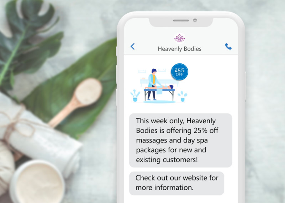 a phone with a promotional text message for 25% off a spa appointment