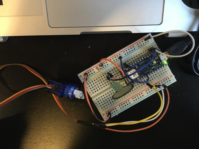 Photo of arduino connected with force sensors and servo motor