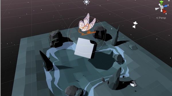 Screen capture of unity with 3d scenes depicting rocks surrounding a pond with a giant cube with butterfly