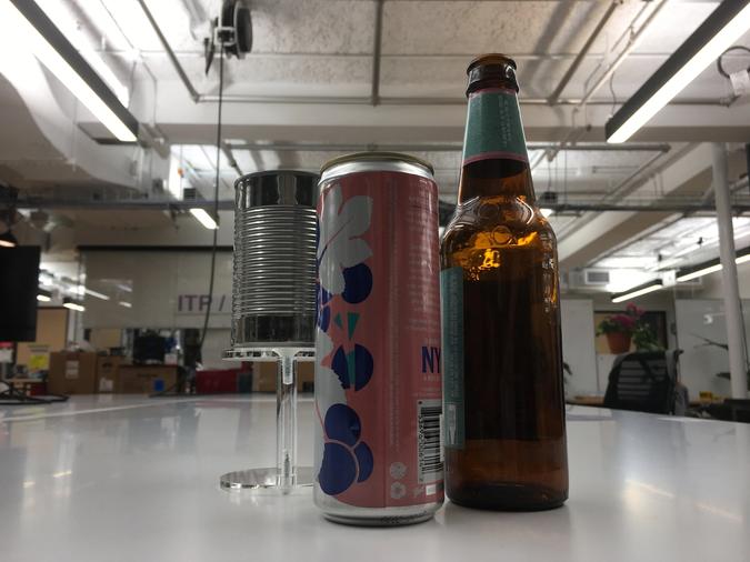 Photo of soup can, aluminum beer can and glass beer bottle