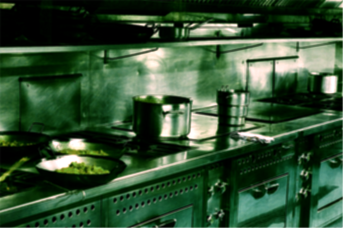 Image of a kitchen with eerie green atmosphere