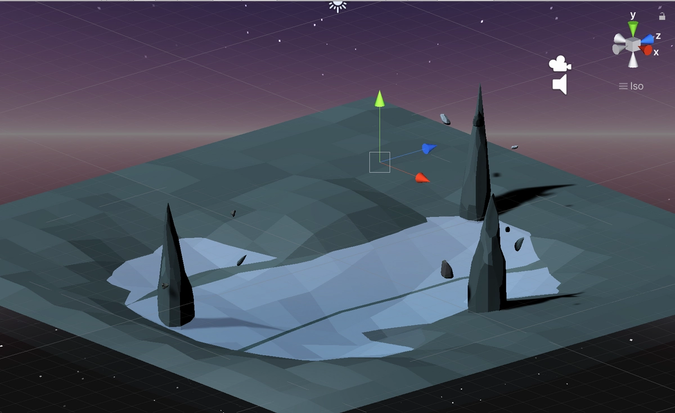 Screen capture of Unity depicting a 3d scene with 3 rock pillars surrounding a pond