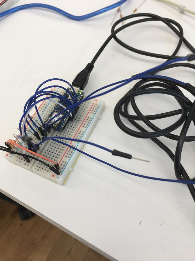 Cables connected to the Arduino Nano 33 IoT - which are supposed to send MIDI signals when I touch the end of the cable