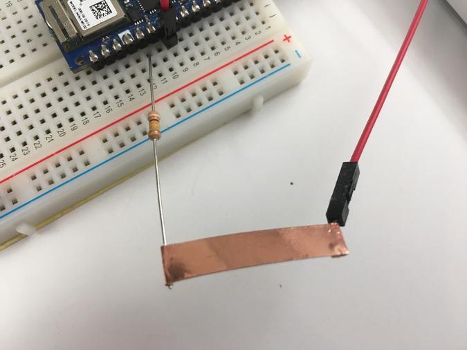 Photo of a copper tape capacitive sensor connected to Arduino