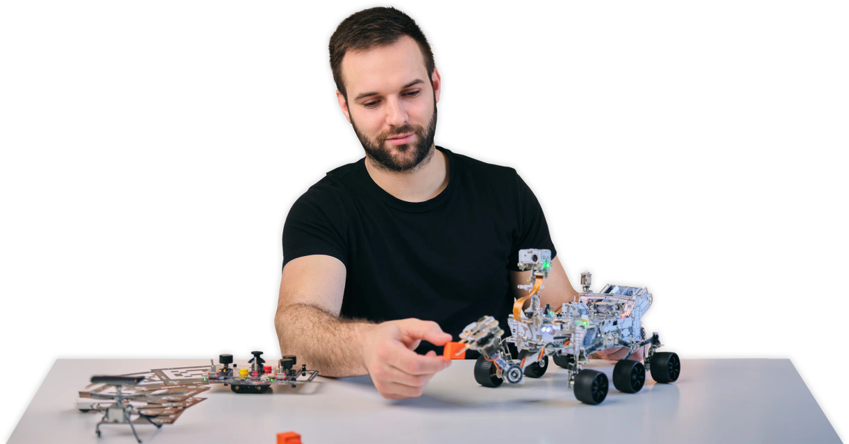 A person playing with CircuitMess NASA Mars Perseverance Rover