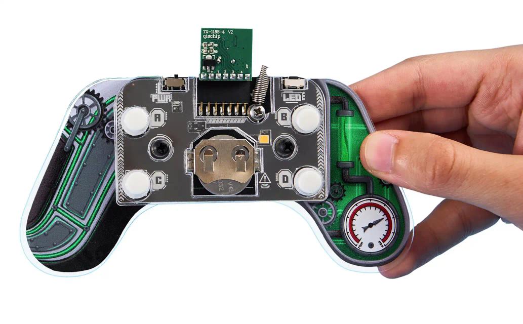 A person holding CircuitMess Sparkly's controller