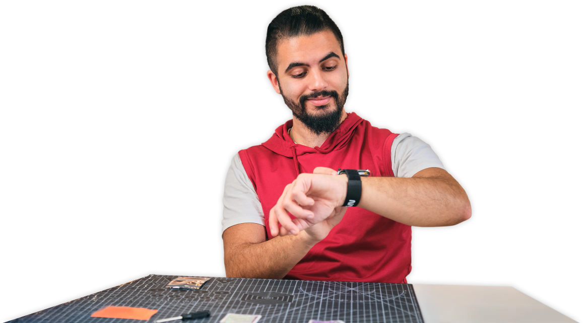 A person with a CircuitMess Artemis Watch 2.0 on his arm