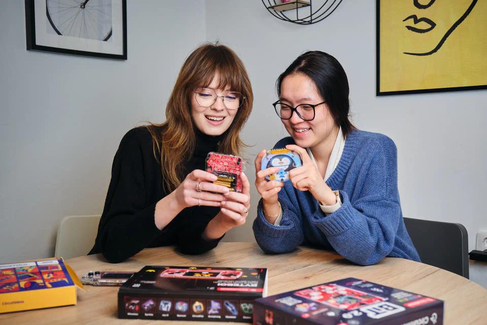 Two girls playing with CircuitMess Bit and Codee
