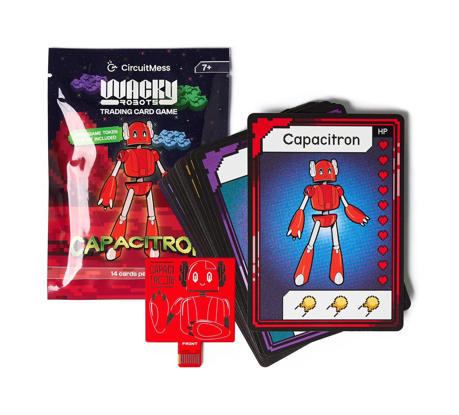 CircuitMess Bit Expansion Capacitron package, card and token on a white background.