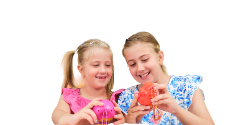 Two girls playing with CircuitMess Beep Boops Tochi and Mochi