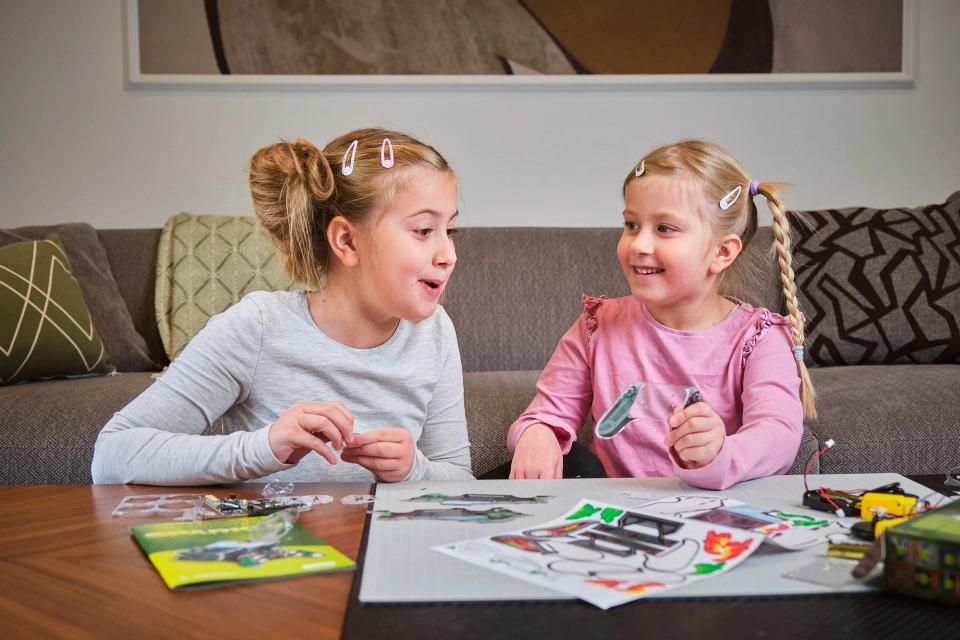 Two girls assembling CircuitMess Sparkly