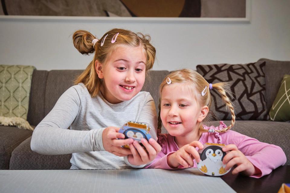 Two girls playing with CircuitMess Codees