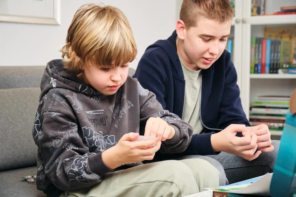 Two boys assembling CircuitMess products