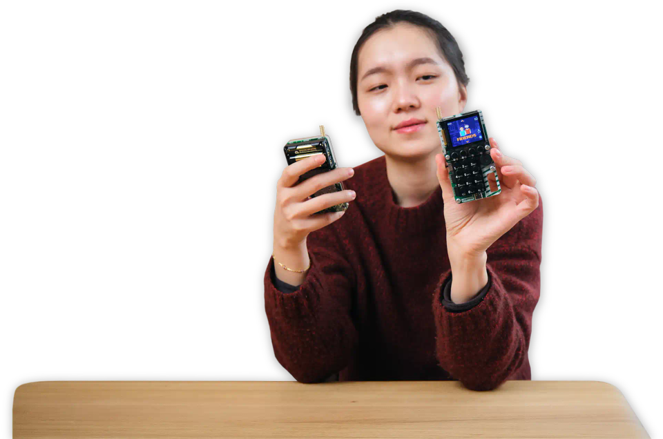 A woman playing with CircuitMess Chatter