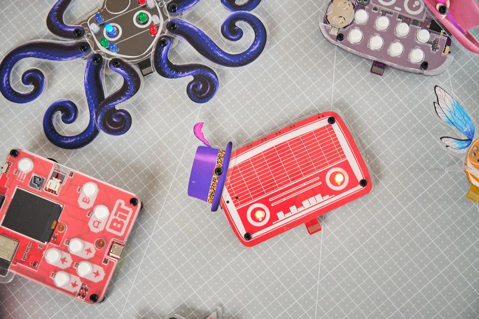 CircuitMess Hertz, Bit, Artemis, and Buttons on a table