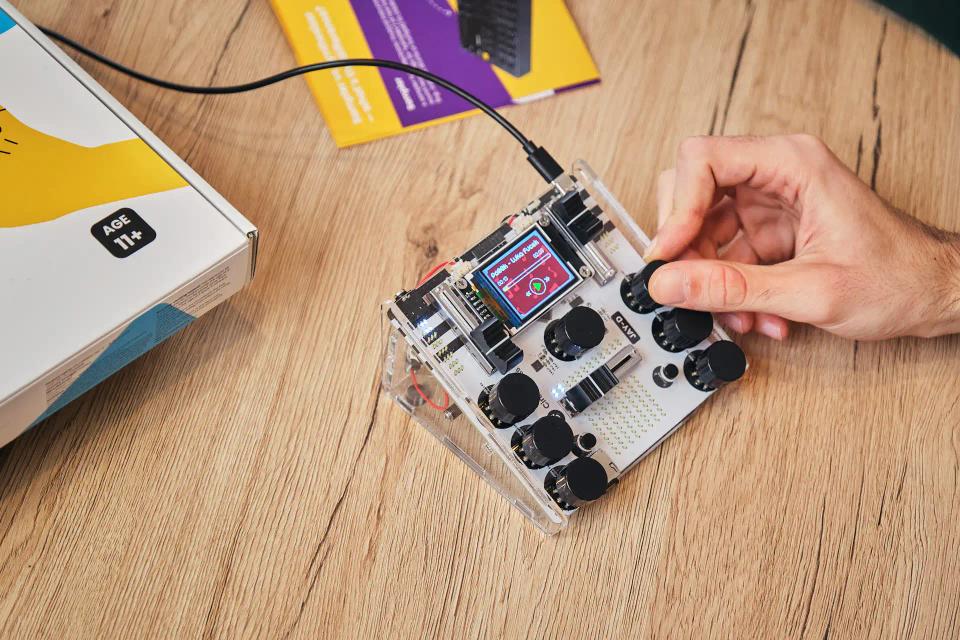 A person playing with CircuitMess Jay-D