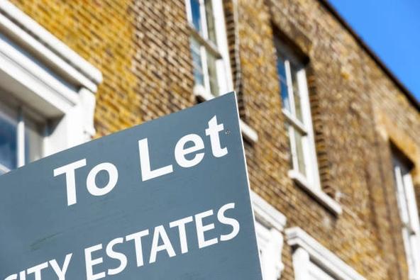 "To Let" board outside a house