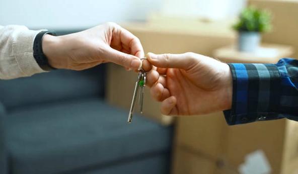Handing over keys to new house