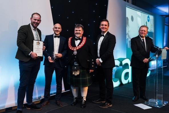 Dr Richard Jack and Luke Smith being presented the award