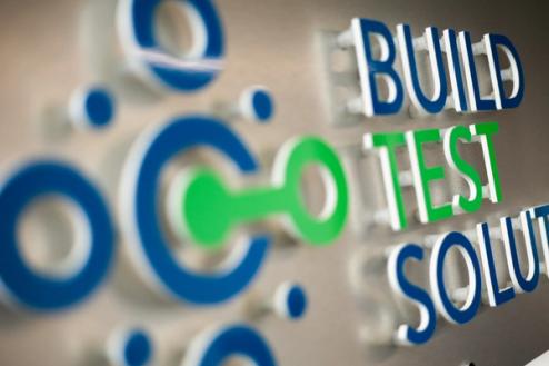 image showing a close up of the bts logo on a wall
