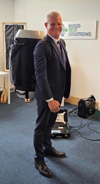 Stuart Andrew MP tries on a Pulse air receiver for size