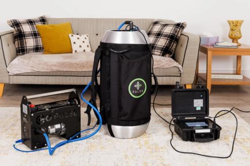 Pulse airtightness testing equipment set up in a home