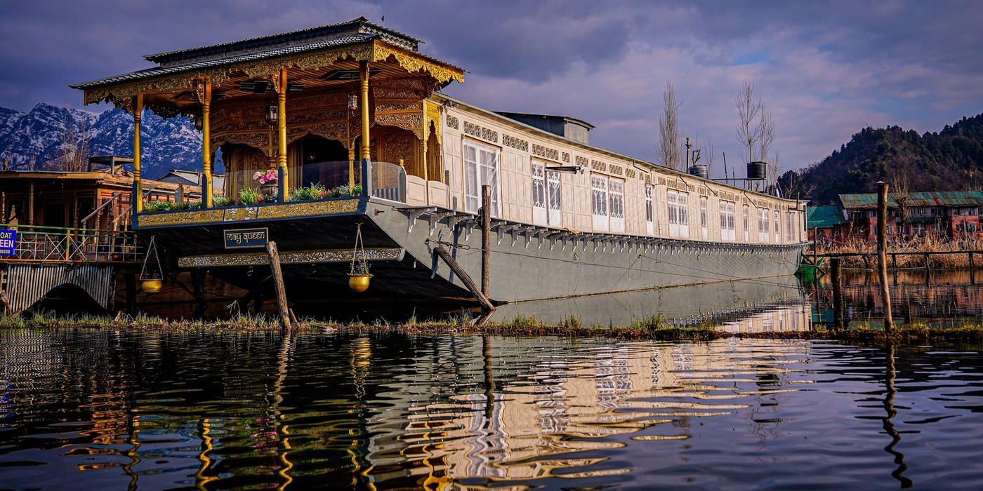 Scenic view of a traditional houseboat on Dal Lake