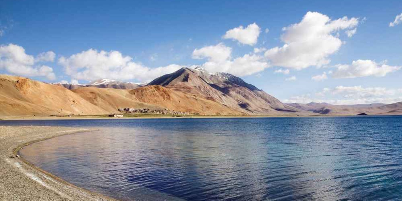 Blue Tso Moriri Lake surrounded by mountains in Ladakh