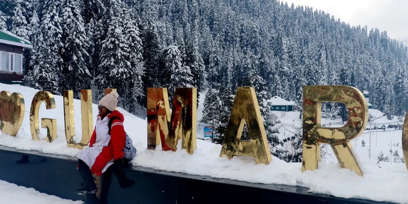 Gulmarg Kashmir meadows and snow-covered mountains with overnight stay
