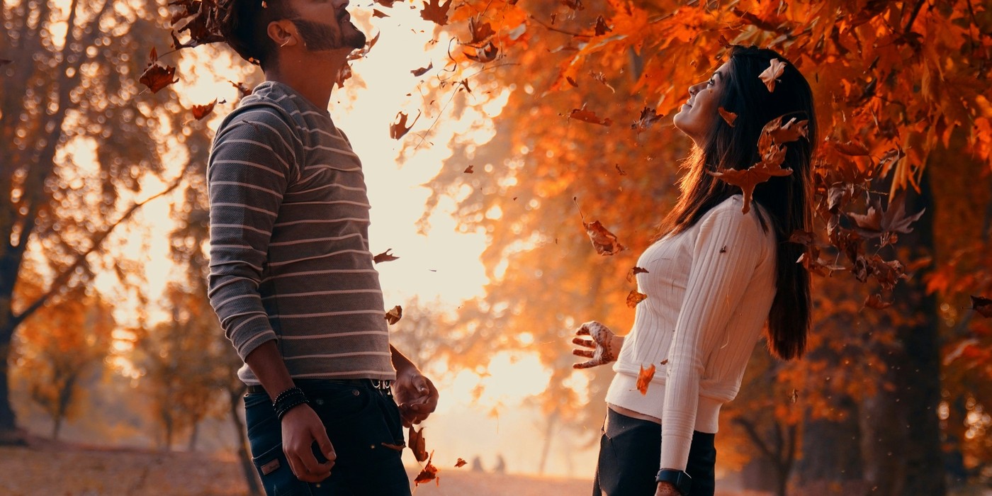 Honeymoon couple enjoying a romantic Kashmir holiday surrounded by scenic mountains