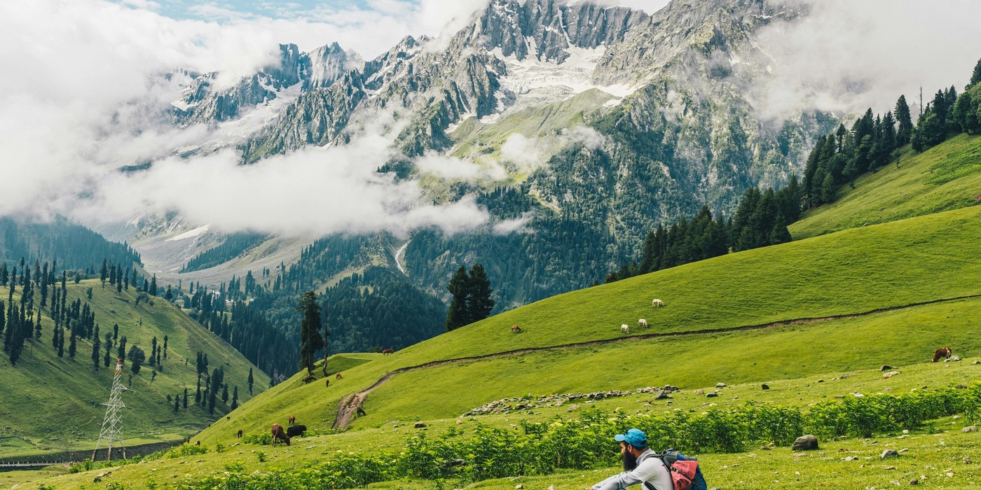 Sonmarg Kashmir with snow capped Himalayan mountains and green valley