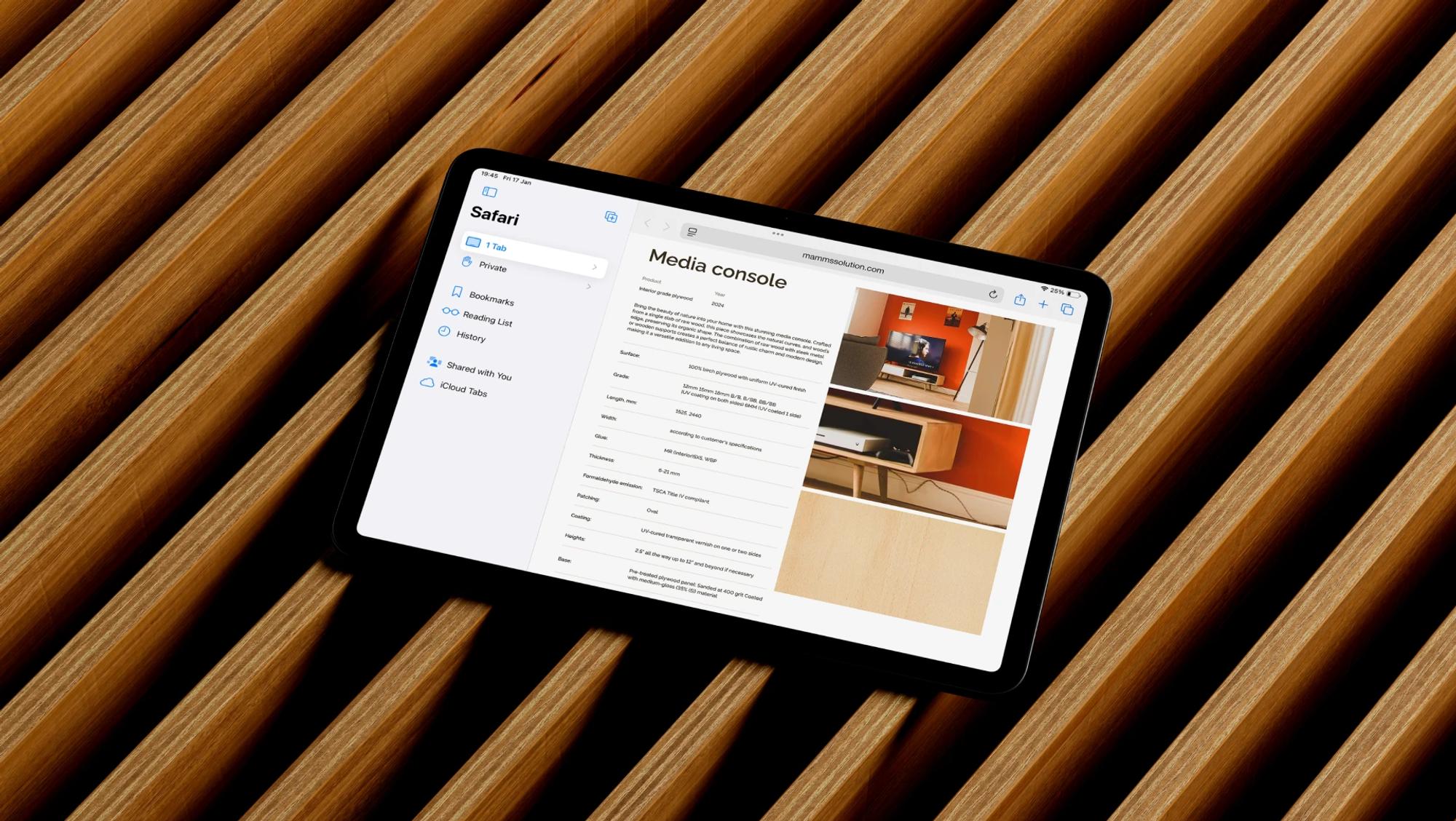 MAMMC product page on a tablet over timber slats