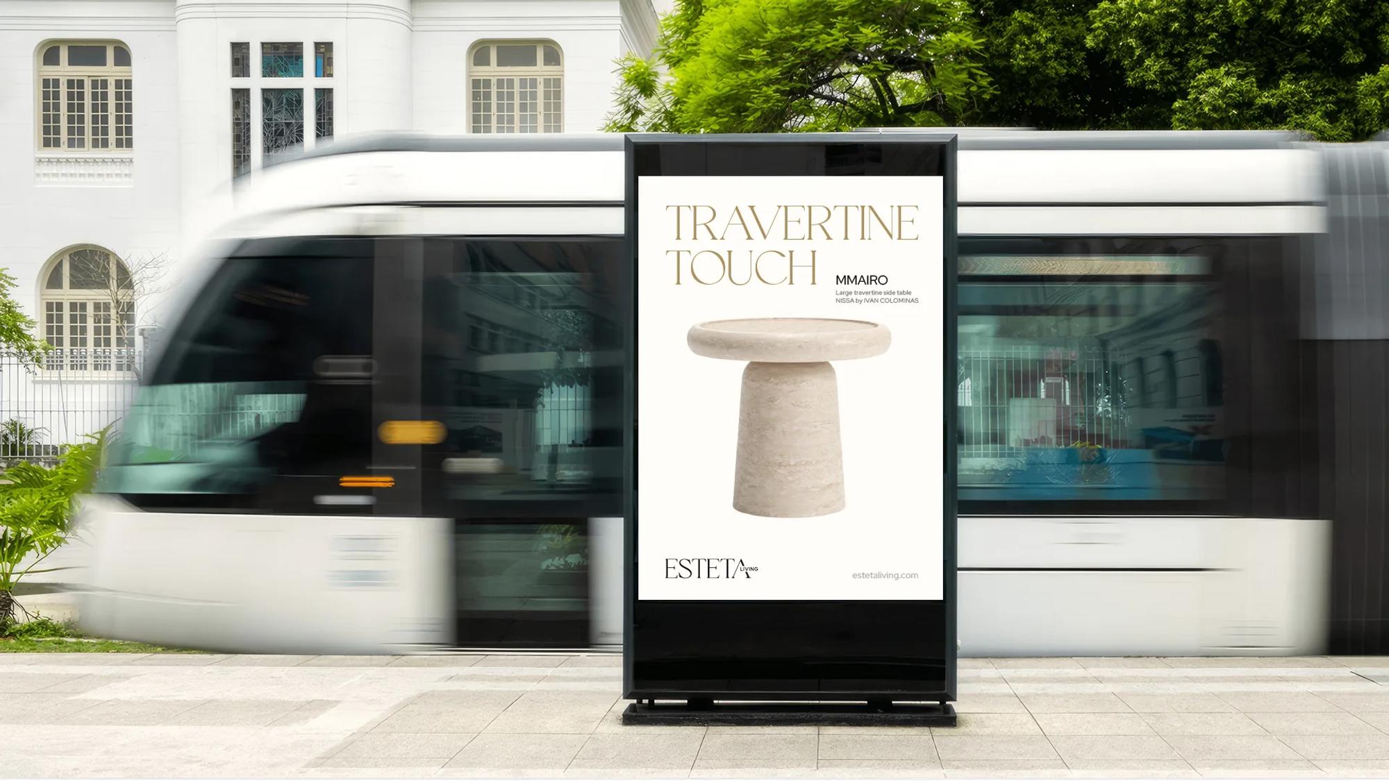 Street ad for a travertine side table at a tram stop