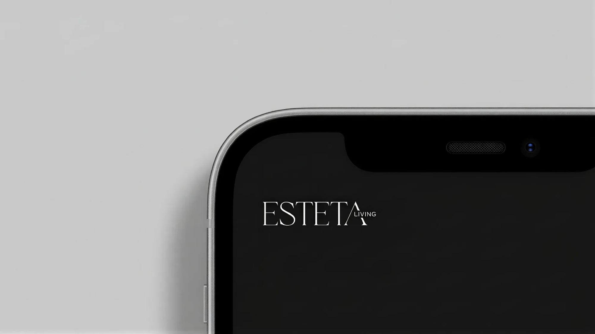 Esteta Living logo on a phone screen
