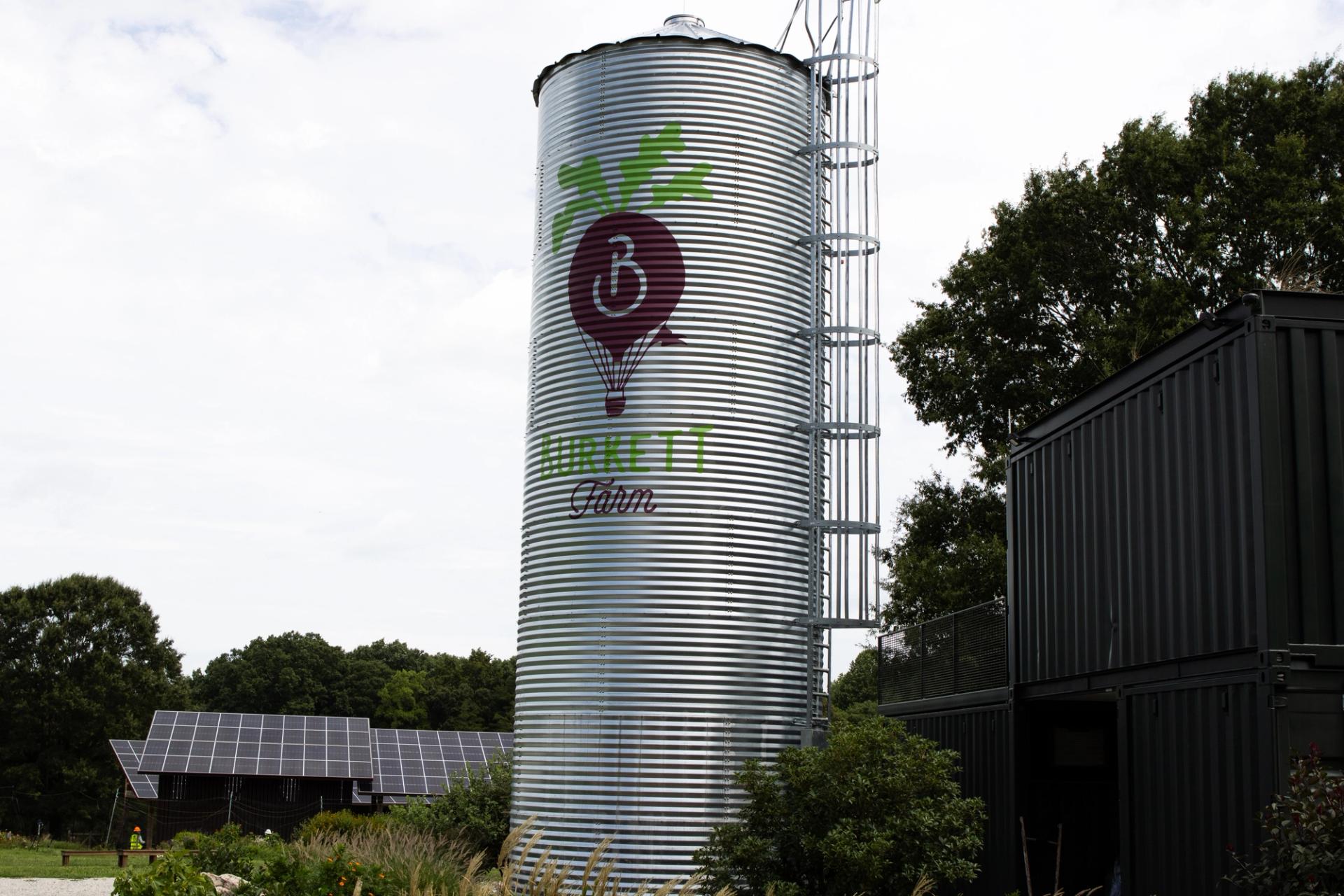 A silo and the container barn at Burkett Farm.