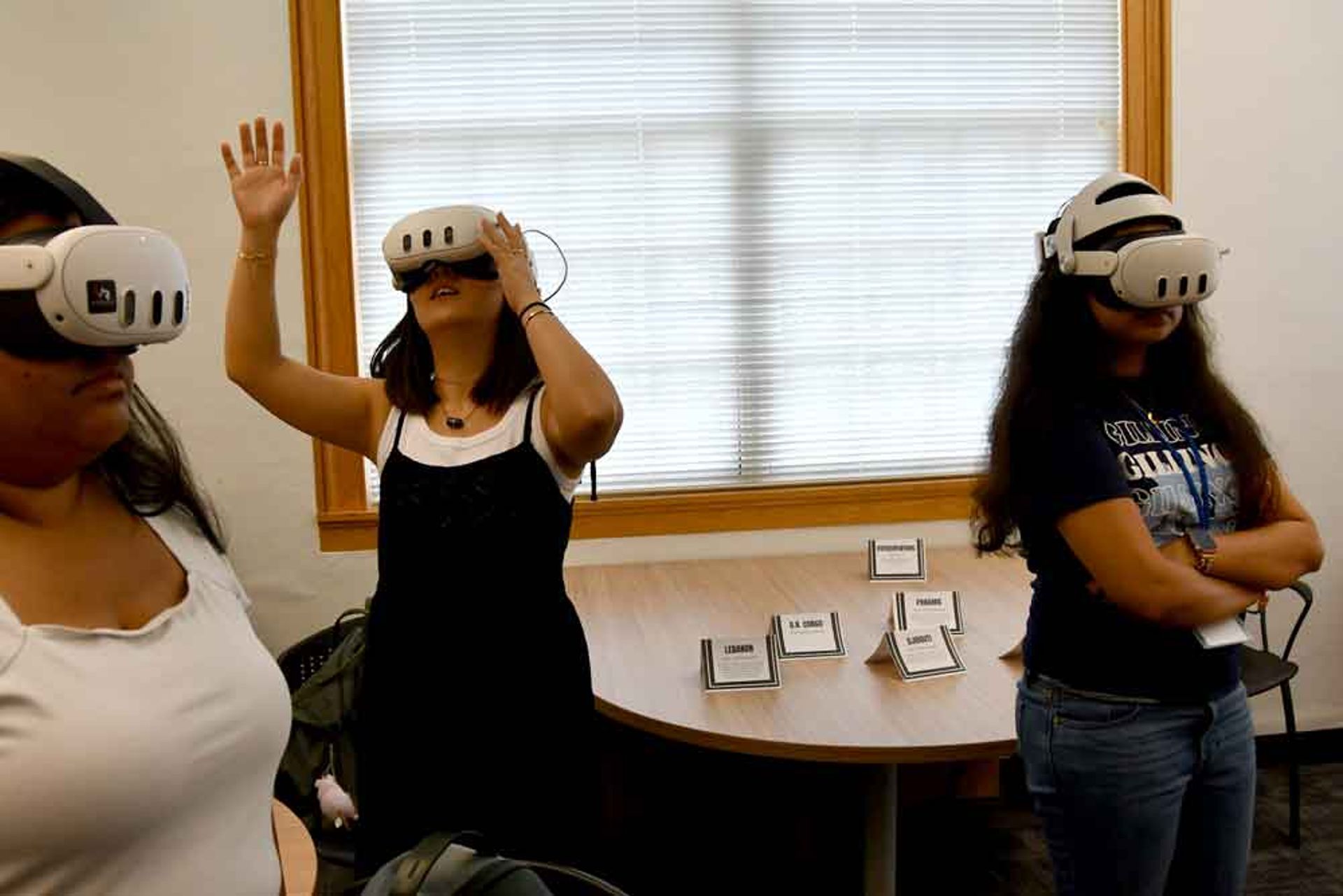 Students wear VR headsets.