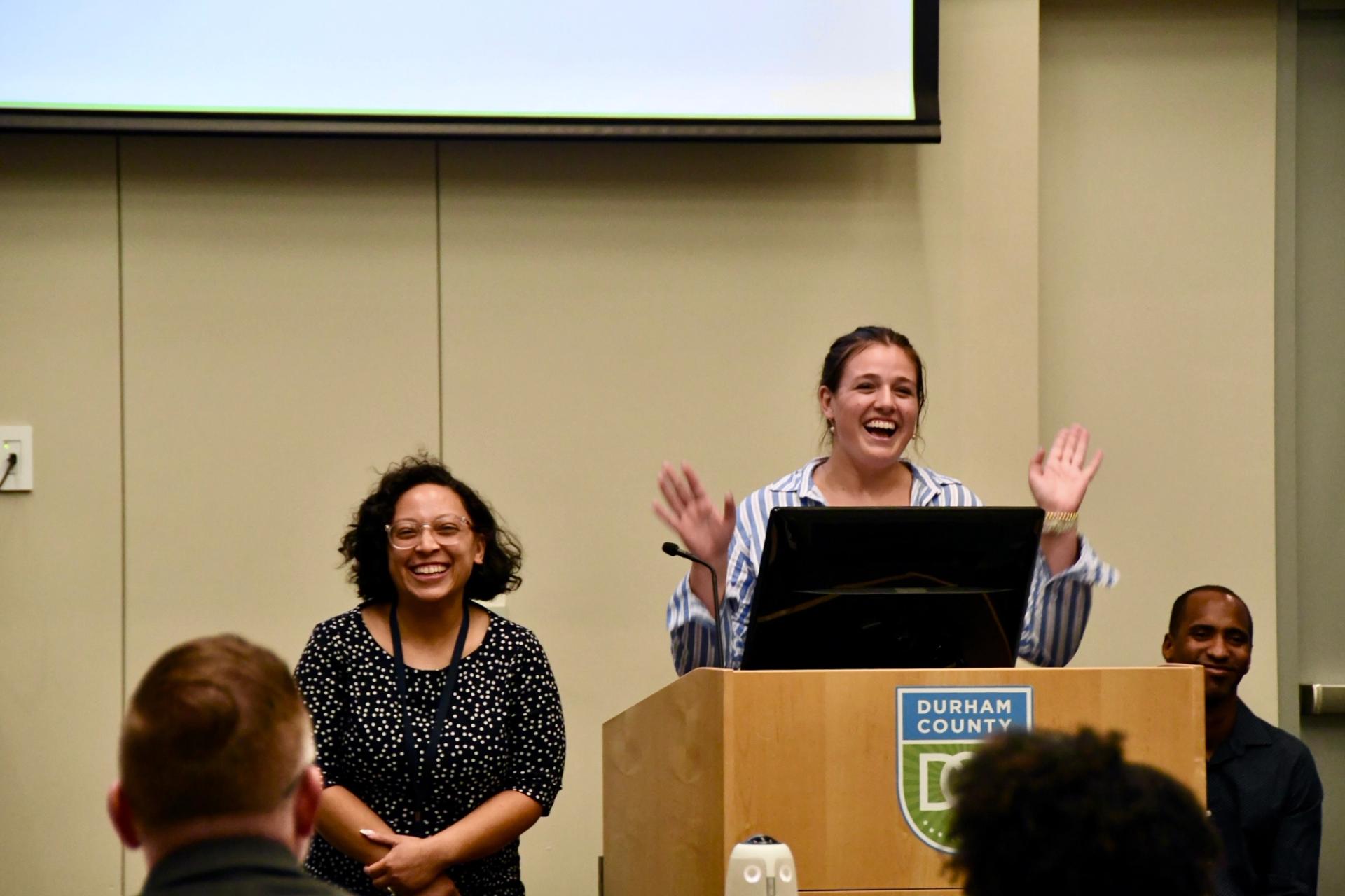 Jasmine Sturdivant (left) and Emma Llewelyn celebrate the passage of their proposal.