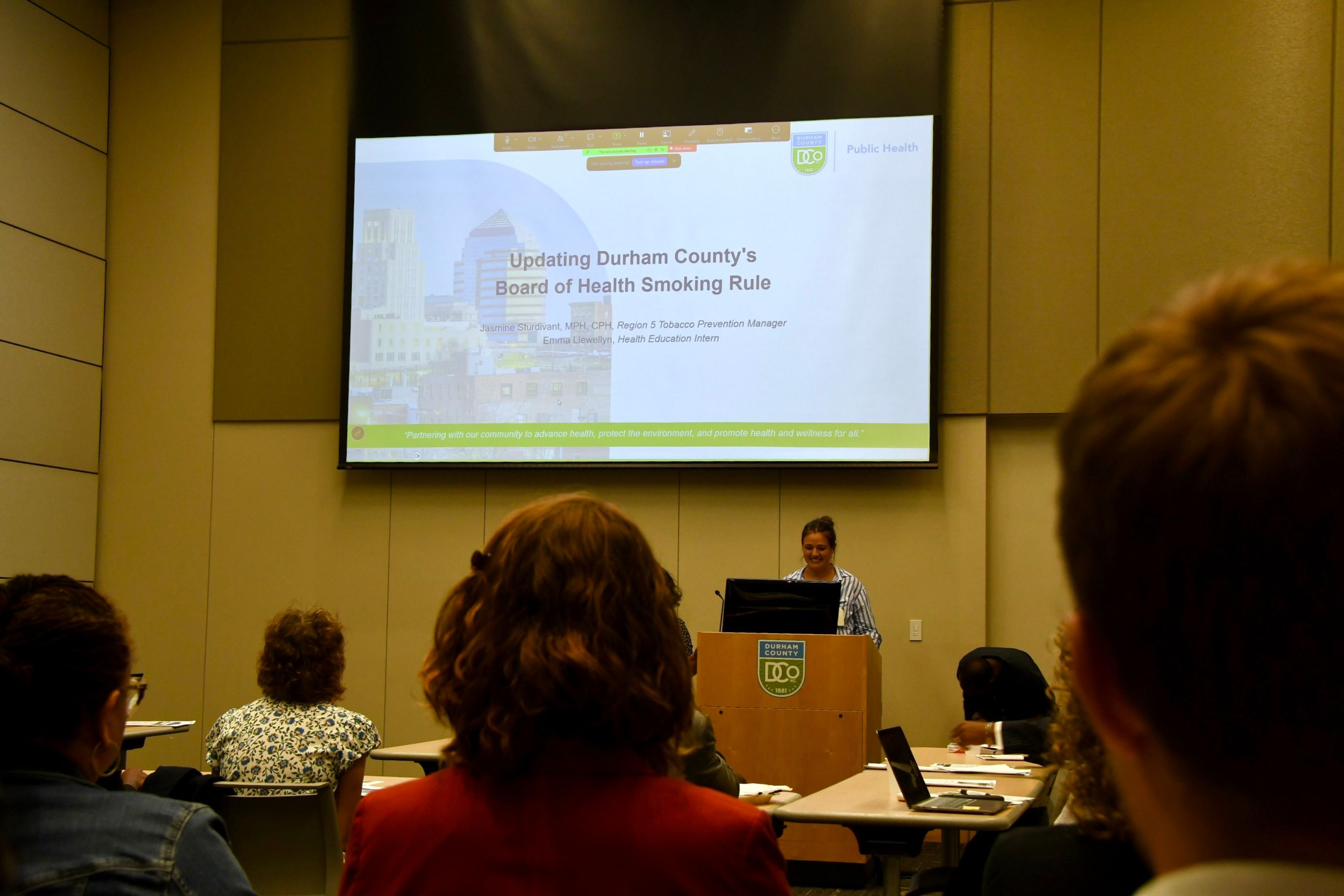 Emma Llewelyn presents to Durham County Board of Health members.