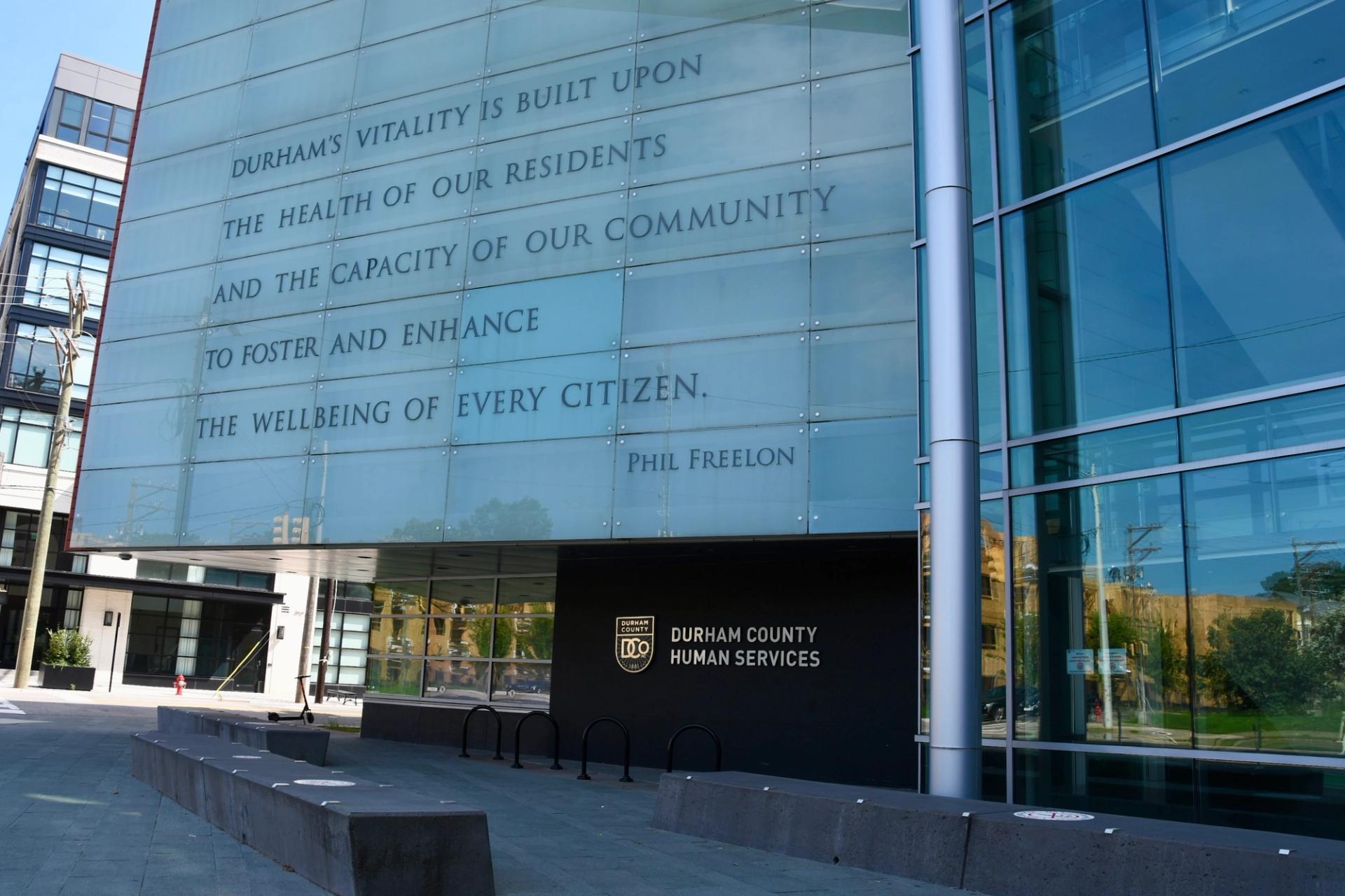 A quote from architect Phil Freelon adorns the exterior of the Durham County public health department.