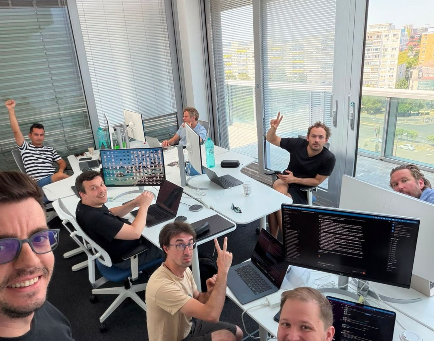 Ralph's development team at their screens