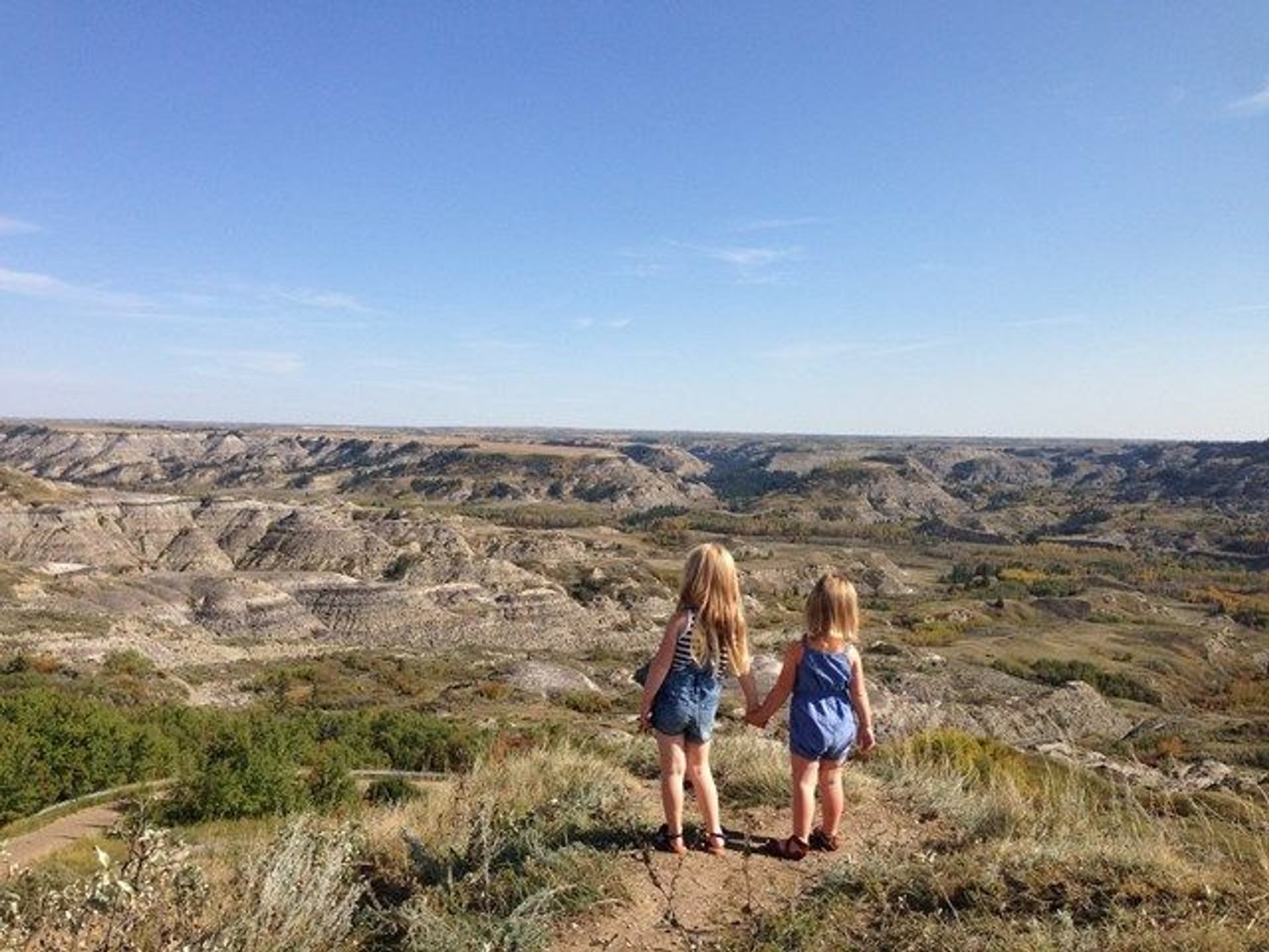 Two young girls looking out at the view.