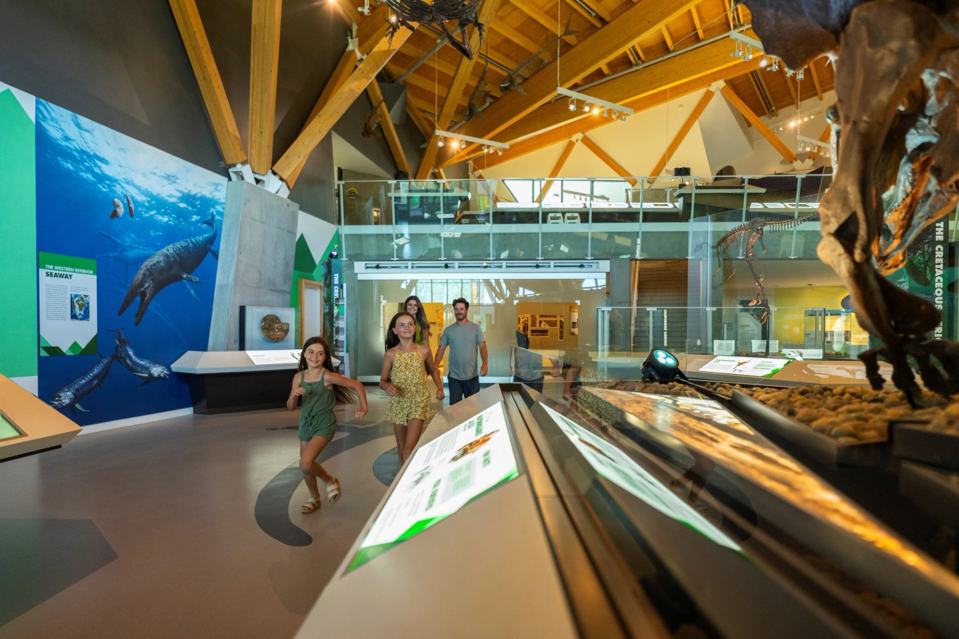 Family exploring the Philip J. Currie Museum.