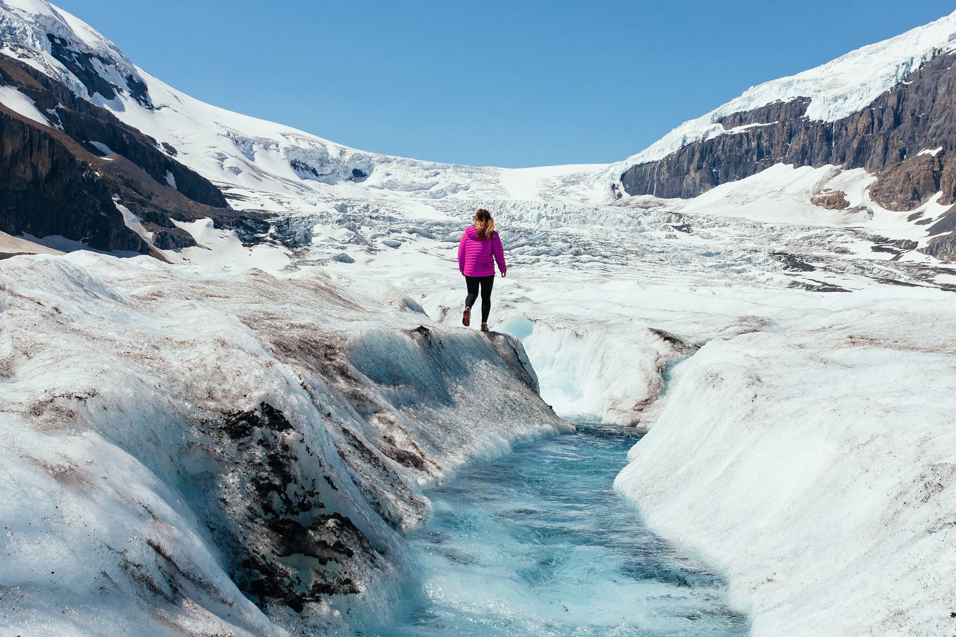 Hiker on the Athabasca Glacier in the Columbia Icefields.