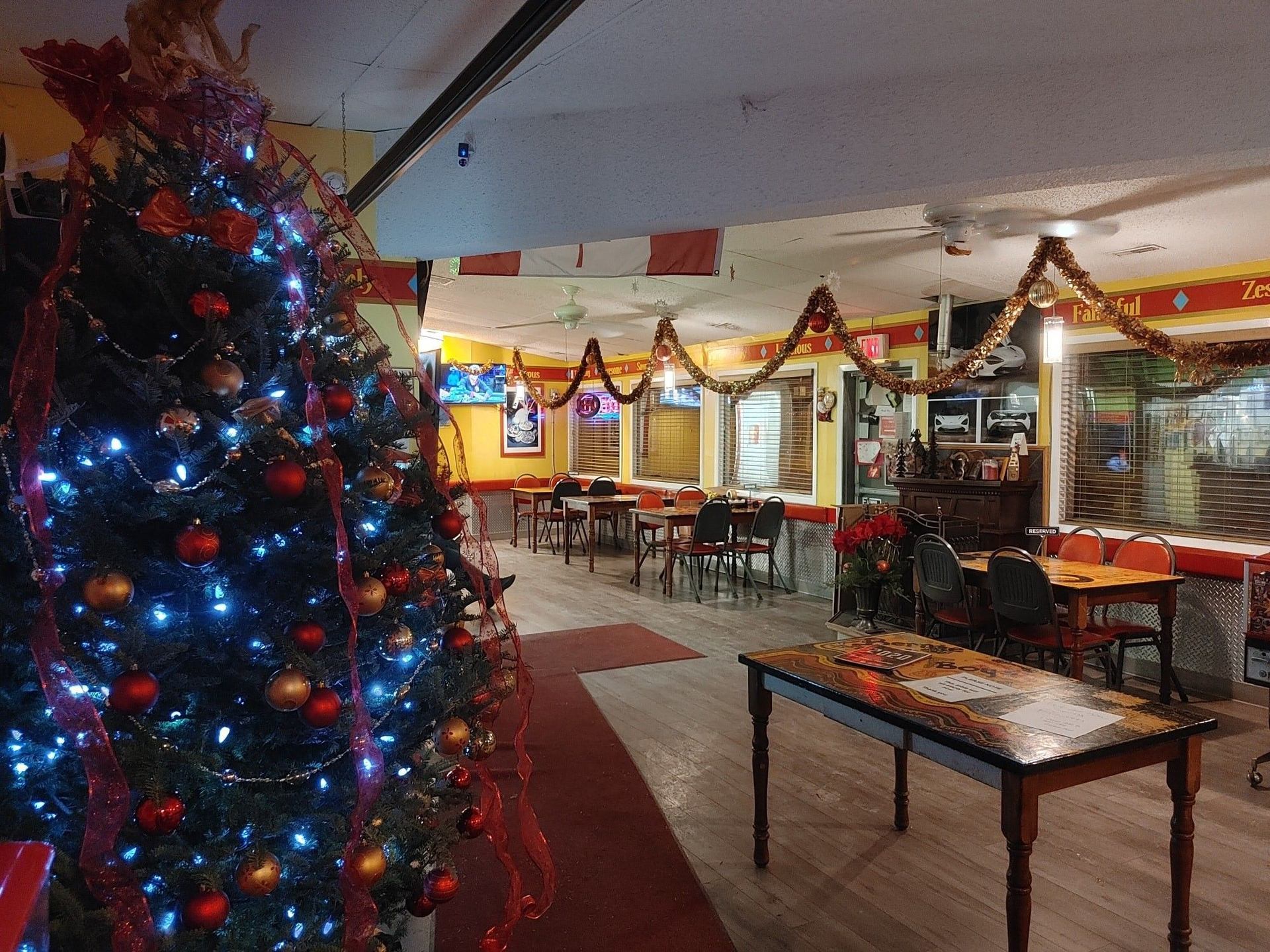 Inside the Bistro during Christmas time with a tree up.