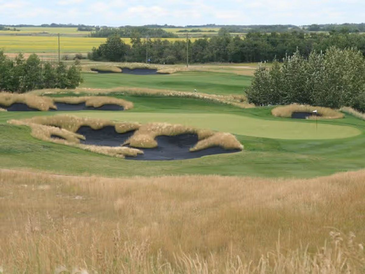 Blacksand traps on the course at Coal Creek Golf Resort.
