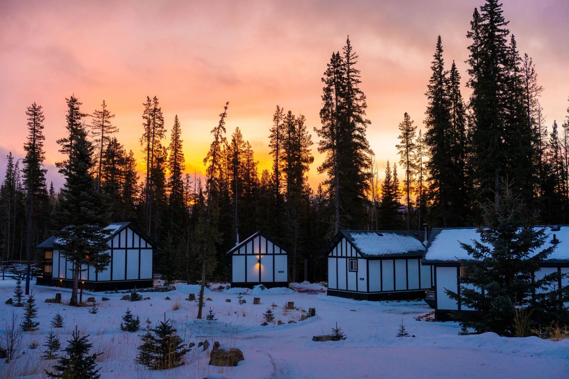 Sunset aerial of cabins at Expanse Cottages.