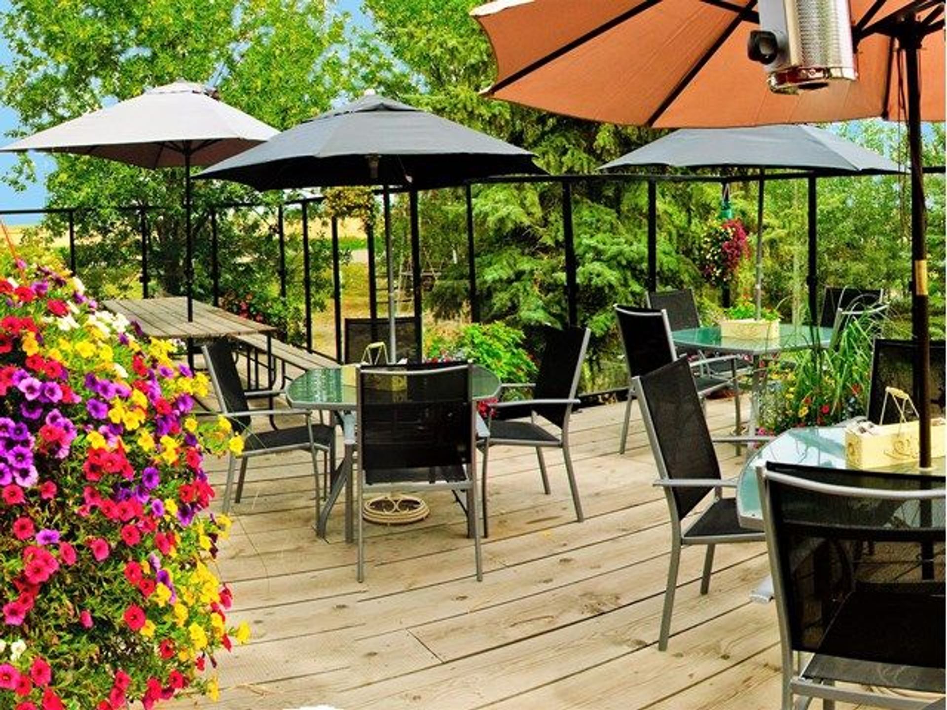 Outdoor patio area of the Aspen Crossing Dining Car Restaurant.